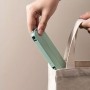 Компактная складная пластиковая вешалка для одежды с зажимами. Зеленый